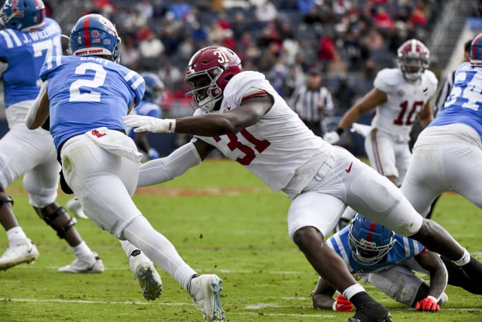Nov 12, 2022; Oxford, Mississippi, USA; Alabama linebacker Will Anderson Jr. (31) pressures Ole Miss quarterback Jaxson Dart (2) at Vaught-Hemingway Stadium. Mandatory Credit: Gary Cosby Jr.-USA TODAY Sports